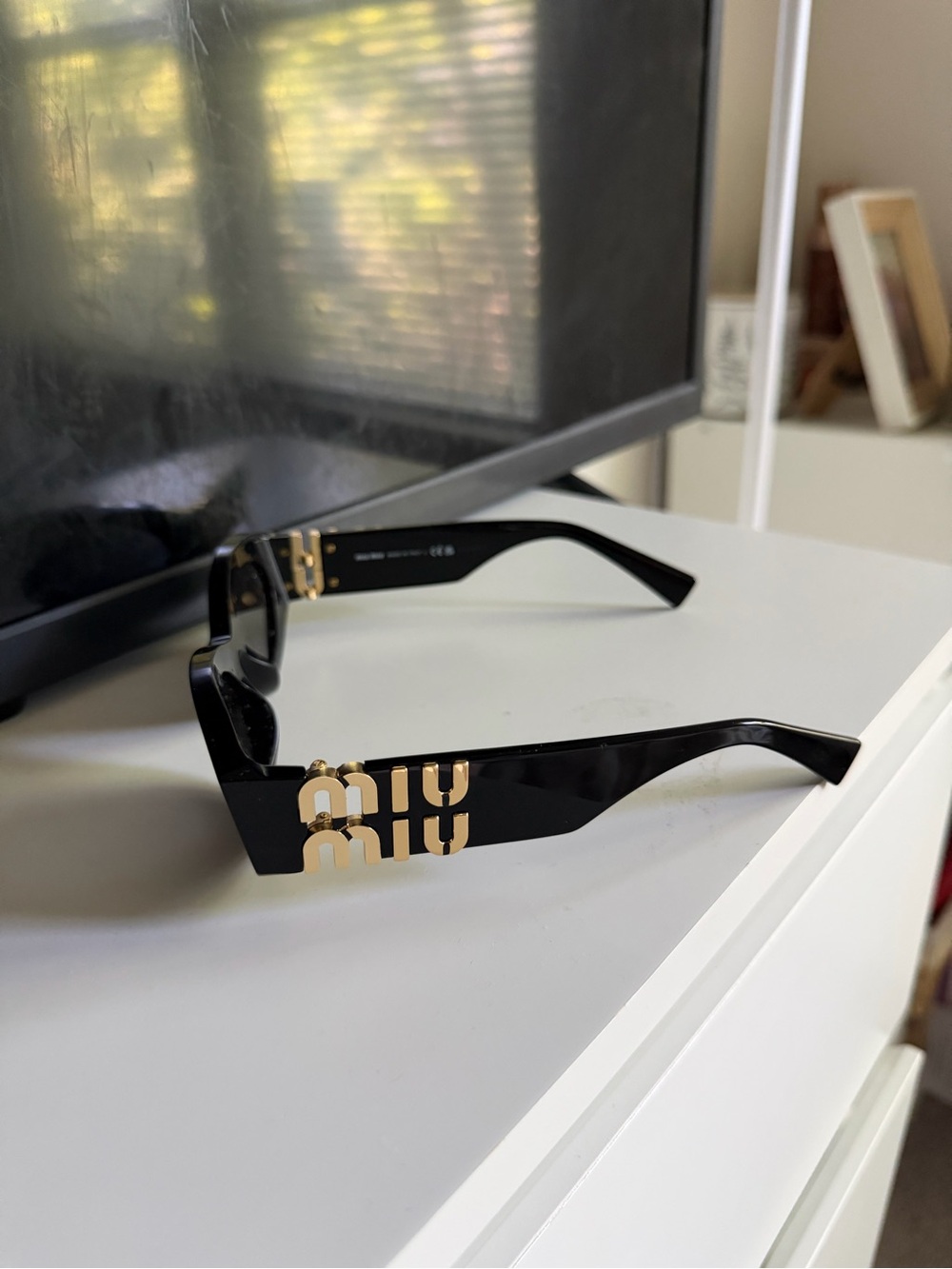 Miu Miu Black Sunglasses with Gold Logo Accent - Picture 8 of 10